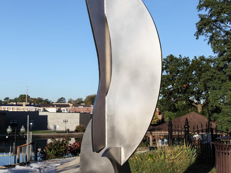 Swimming Dolphins Sculpture