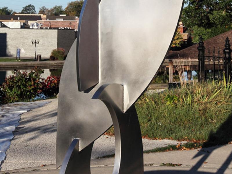 Swimming Dolphins Sculpture