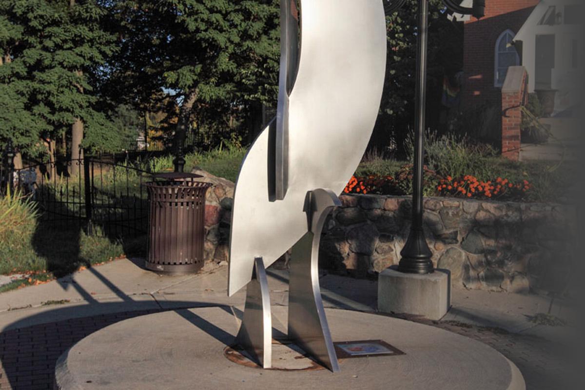 Swimming Dolphins Sculpture